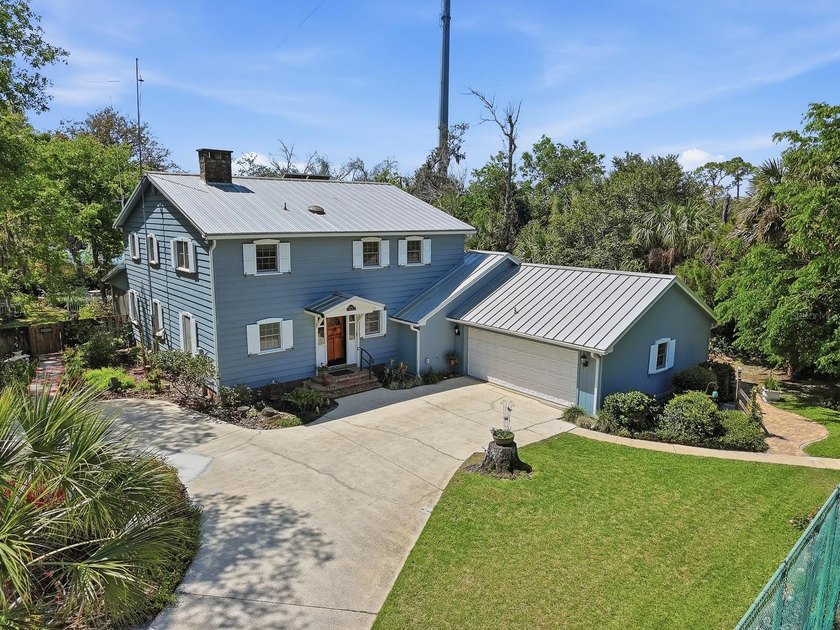 This extraordinary Craftsman-style estate offers almost 4,000 - Beach Home for sale in Port Orange, Florida on Beachhouse.com