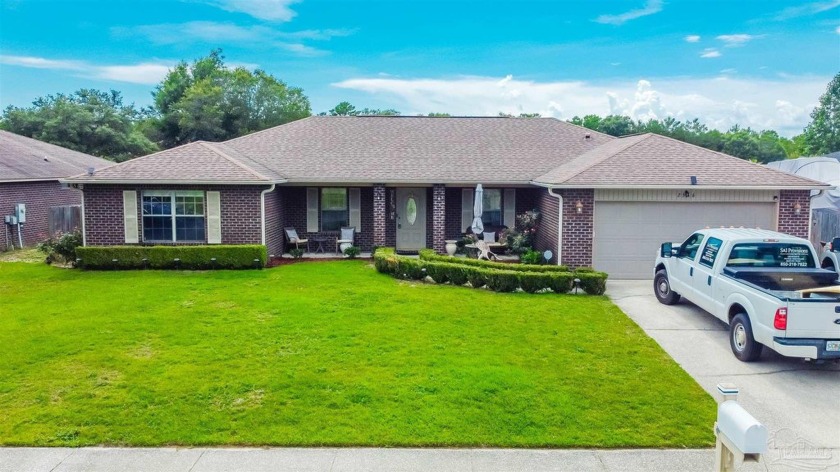 Beautiful home with several amenities in Navarre! Located in - Beach Home for sale in Navarre, Florida on Beachhouse.com