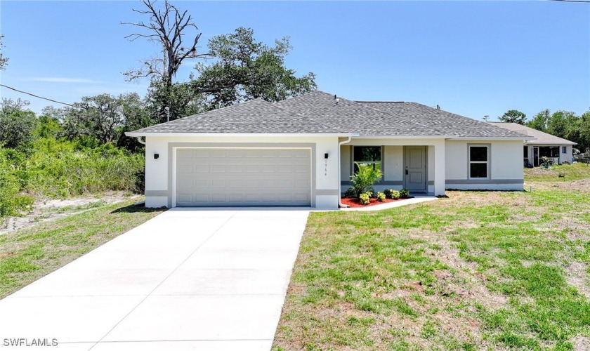 You Will Be Amazed By The Quality Of This Brand New Construction - Beach Home for sale in Lehigh Acres, Florida on Beachhouse.com