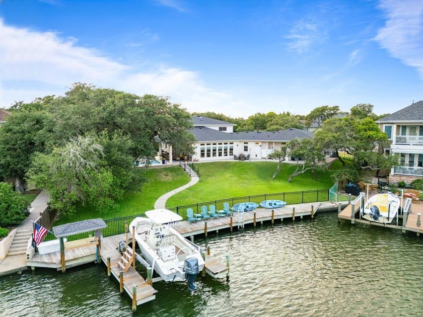 Welcome to 2110 Harbor Ct, a custom waterfront retreat located - Beach Home for sale in Rockport, Texas on Beachhouse.com