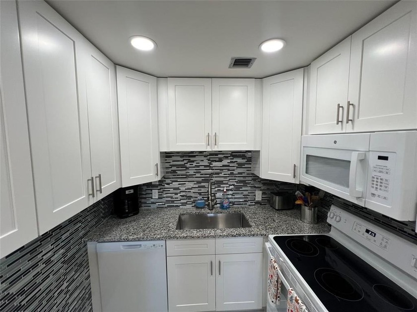 Welcome home to this two-bedroom, one-and-a-half-bath condo - Beach Condo for sale in Deerfield Beach, Florida on Beachhouse.com