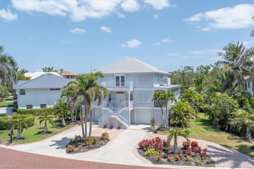 Just steps from the prestigious Barefoot Beach, experience - Beach Home for sale in Bonita Springs, Florida on Beachhouse.com