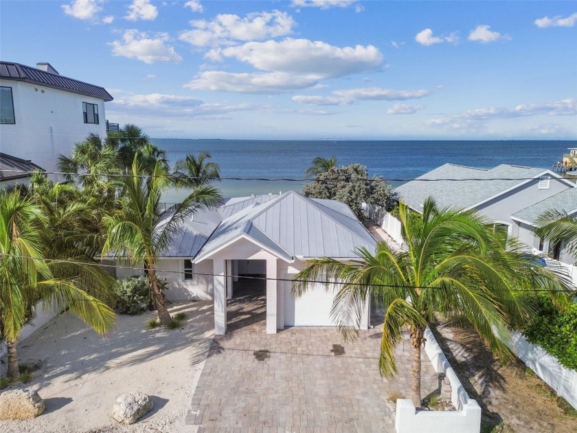 Discover your beachfront oasis directly on Tampa Bay! Step out - Beach Home for sale in Anna Maria, Florida on Beachhouse.com