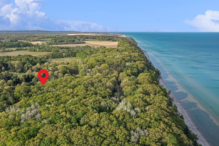 Amazing location for this wooded building site just steps from - Beach Acreage for sale in Mears, Michigan on Beachhouse.com