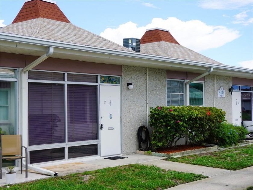 NOT IN A FLOOD ZONE! Discover this bright and cheerful 1-bedroom - Beach Condo for sale in Holiday, Florida on Beachhouse.com