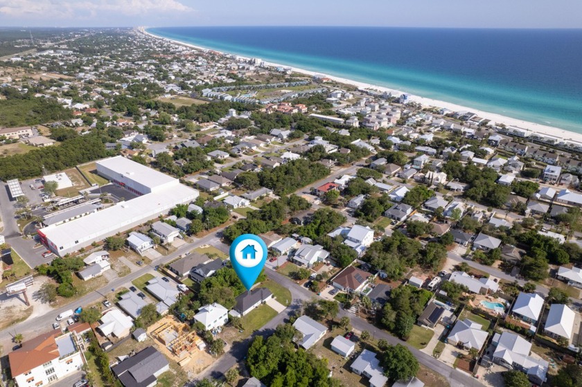 Modernized with mixed board and batten vinyl siding, the - Beach Home for sale in Panama City Beach, Florida on Beachhouse.com