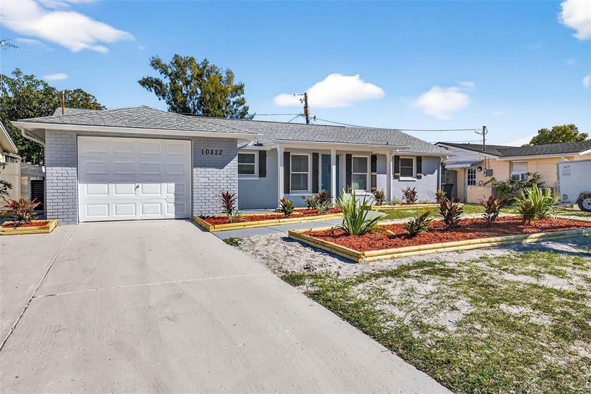Get ready to fall in love this fully renovated home is one of - Beach Home for sale in Port Richey, Florida on Beachhouse.com