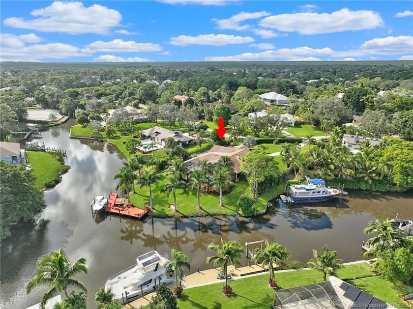 Welcome home ! STUNNING WATERFRONT RETREAT in the sought-after - Beach Home for sale in Palm City, Florida on Beachhouse.com