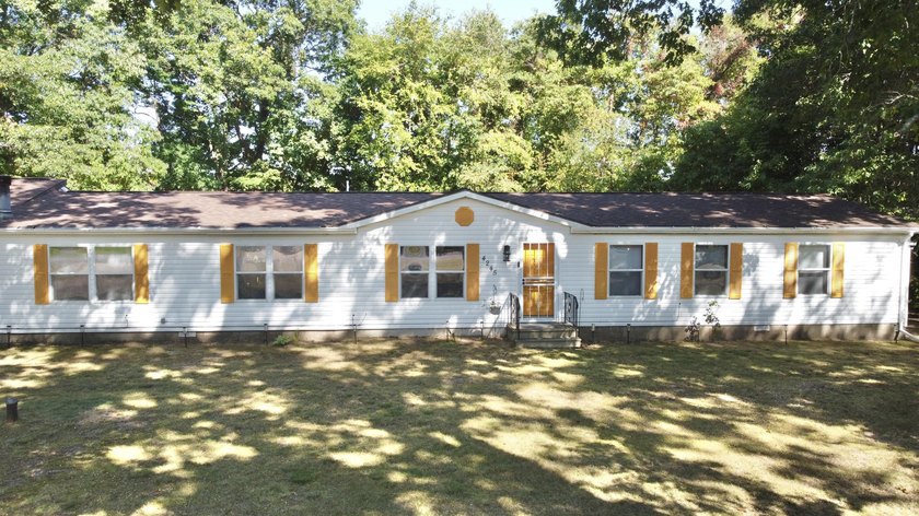 This custom-designed 4-bedroom ranch home, lovingly maintained - Beach Home for sale in Benton Harbor, Michigan on Beachhouse.com