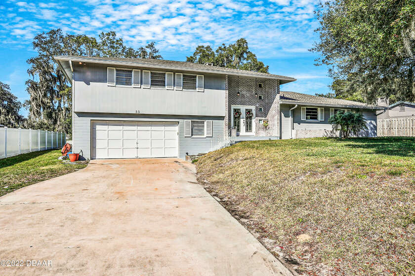 LOCATED IN SOUGHT AFTER TOMOKA OAKS! 5BD/3.5B A With room for - Beach Home for sale in Ormond Beach, Florida on Beachhouse.com