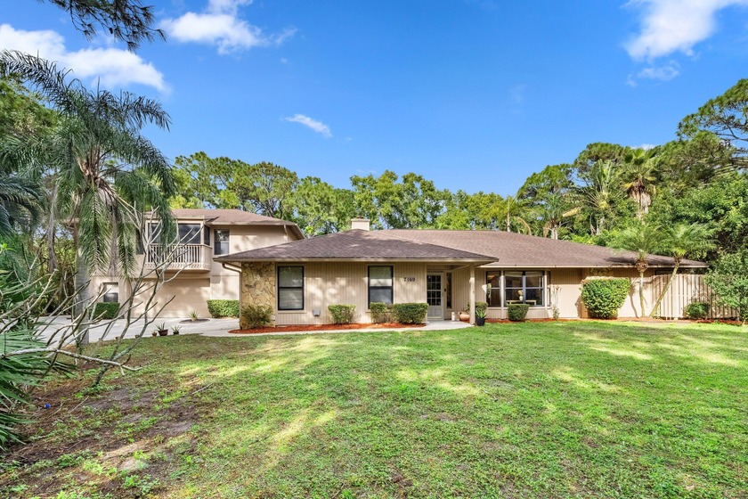 Discover a rare private retreat in the heart of the highly - Beach Home for sale in Palm Beach Gardens, Florida on Beachhouse.com