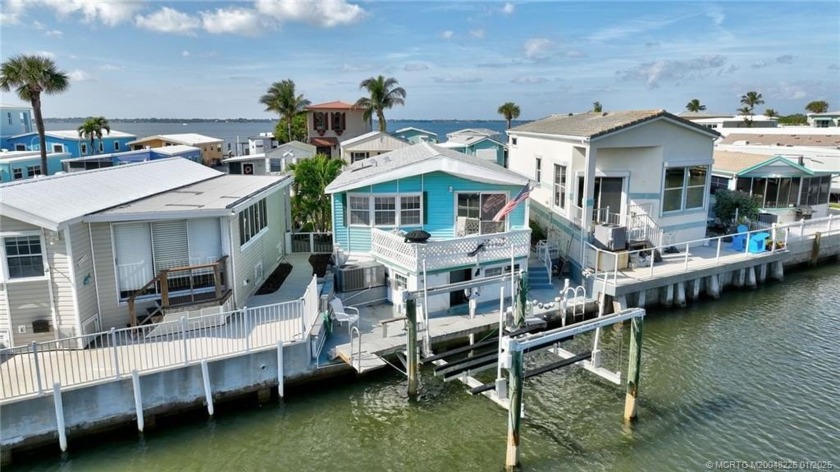 Coastal Paradise with Modern updates! Nestled in a resort-style - Beach Home for sale in Jensen Beach, Florida on Beachhouse.com