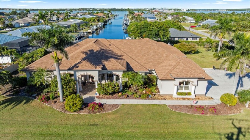 Just STUNNING! Discover an exceptional estate home that blends - Beach Home for sale in Port Charlotte, Florida on Beachhouse.com