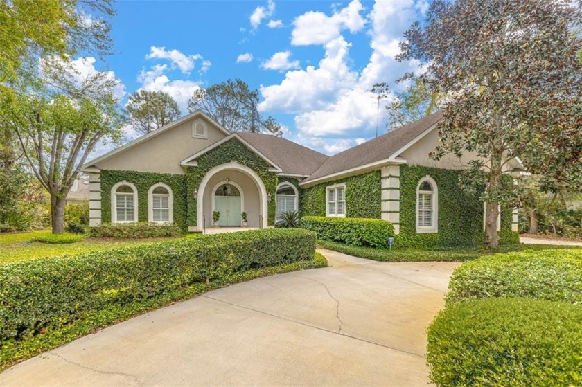 Elegant all one-level stucco home with many custom features - Beach Home for sale in Saint Simons, Georgia on Beachhouse.com