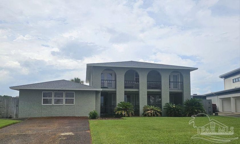 THIS IS IT!  GRANDE LAGOON BOAT BASIN - BOAT DOCK AND MASSIVE - Beach Home for sale in Pensacola, Florida on Beachhouse.com