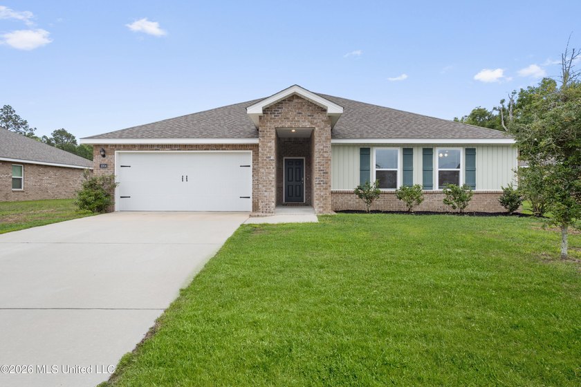 Tucked away on a premium lot in The Enclave, this beautifully - Beach Home for sale in Long Beach, Mississippi on Beachhouse.com