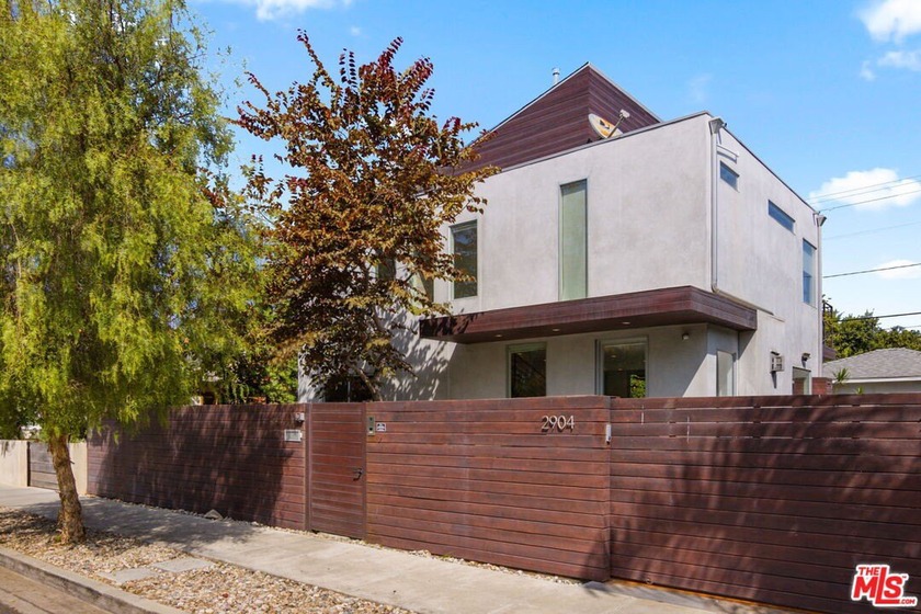 Nestled behind gated entry, along one of Venice's most coveted - Beach Home for sale in Venice, California on Beachhouse.com
