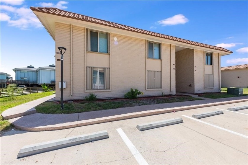 A popular two-bedroom beachfront condo centrally located in Port - Beach Condo for sale in Port Aransas, Texas on Beachhouse.com