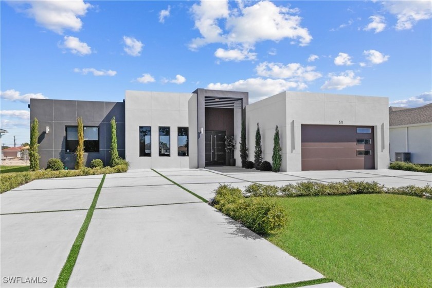 Welcome to this Stunning Waterfront residence, where modern - Beach Home for sale in Cape Coral, Florida on Beachhouse.com