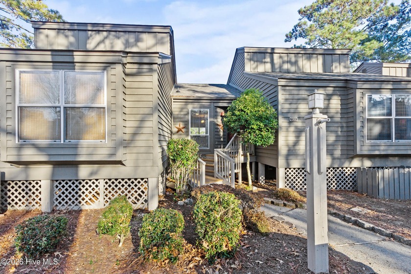 Set on a quiet street with peaceful views of Tradewinds Lake - Beach Condo for sale in New Bern, North Carolina on Beachhouse.com