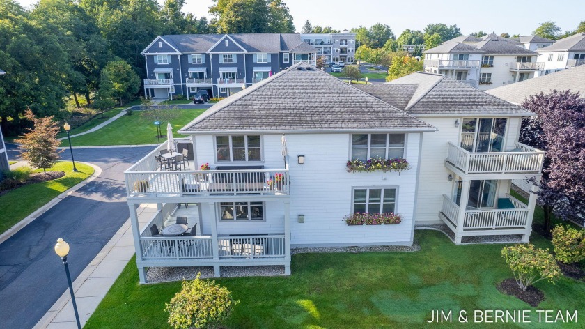 This stunning main floor end unit in Douglas Harbor Village - Beach Condo for sale in Douglas, Michigan on Beachhouse.com