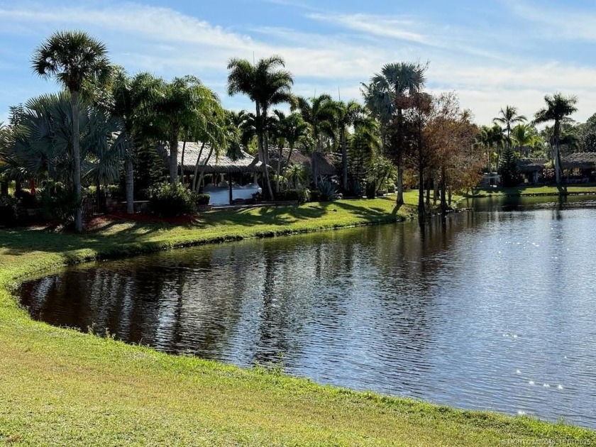 PRIME LOCATION WITH STUNNING LAKE VIEWS! Situated near the - Beach Lot for sale in Port Saint Lucie, Florida on Beachhouse.com