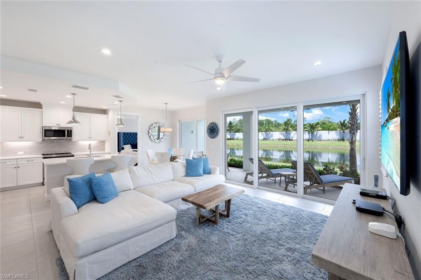 Why wait to build?  This 2022 END UNIT with Lake and Fountain - Beach Condo for sale in Naples, Florida on Beachhouse.com