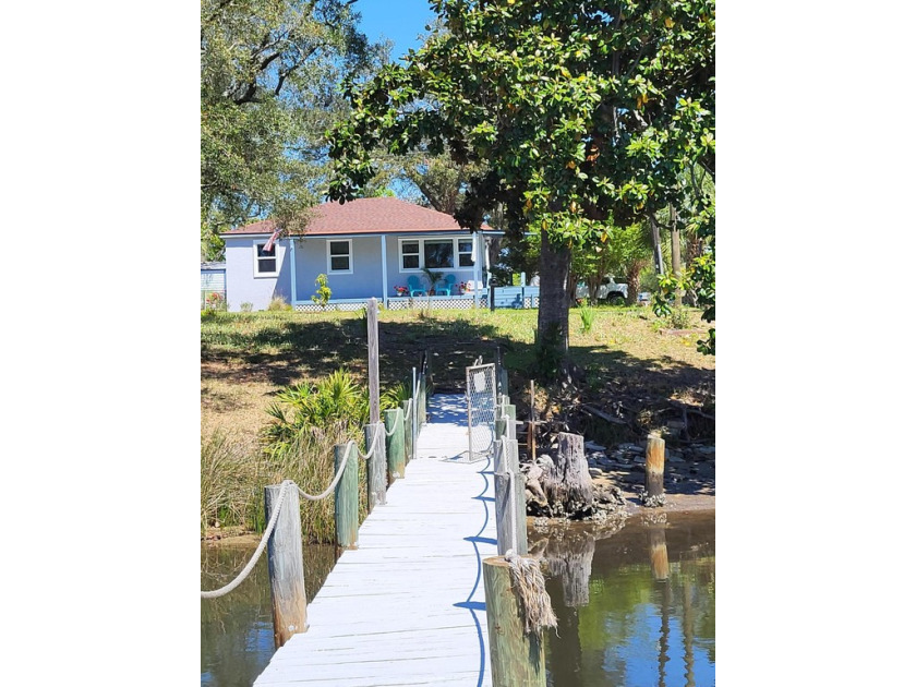This spectacular Bungalow, in Historic St. Andrews, is on Lake - Beach Home for sale in Panama City, Florida on Beachhouse.com