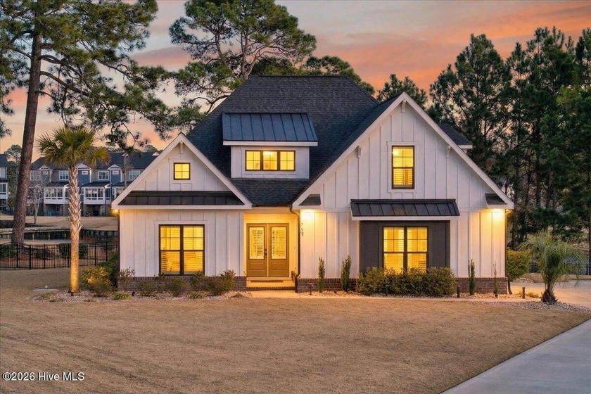 Step inside this luxury modern coastal craftsman home, perfectly - Beach Home for sale in Sunset Beach, North Carolina on Beachhouse.com