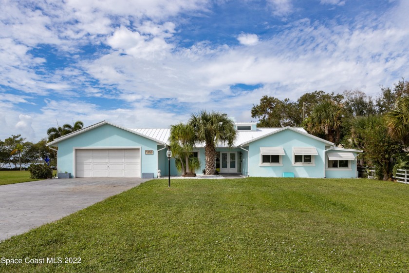 BEAUTIFUL DIRECT WATERFRONT ESTATE ON OVER 2.3 ACRE LOT.  THIS - Beach Home for sale in Merritt Island, Florida on Beachhouse.com