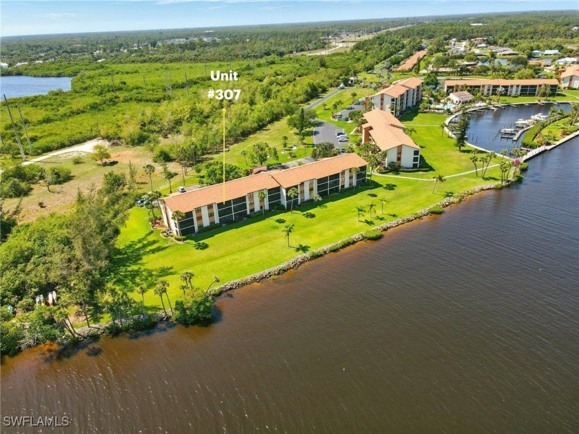 RIVERFRONT LIFESTYLE | TOP-FLOOR TURNKEY CONDO WITH STUNNING - Beach Condo for sale in North Fort Myers, Florida on Beachhouse.com