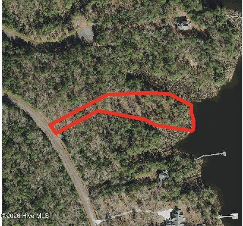 WATERFRONT LOT ON PEACEFUL CREEK - Nestled in the gated - Beach Lot for sale in Belhaven, North Carolina on Beachhouse.com