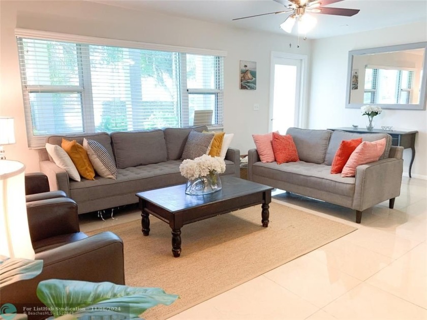 This contemporary 3-bed, 2-bath home offers modern comfort with - Beach Home for sale in Dania, Florida on Beachhouse.com