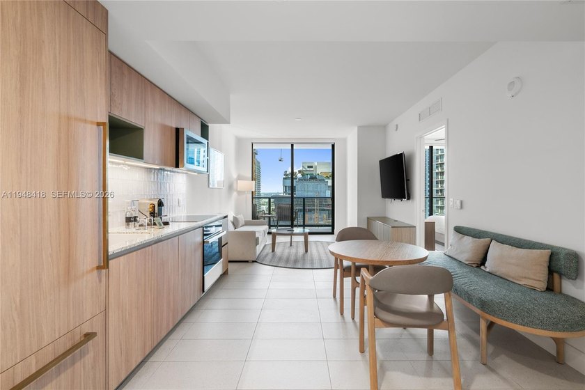 Bright and fully furnished 1-bedroom, 1-bath residence on a high - Beach Condo for sale in Miami, Florida on Beachhouse.com