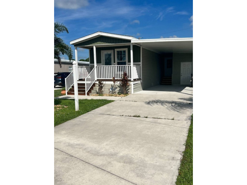 Step into comfort and convenience in this modern 3-bedroom - Beach Home for sale in Vero Beach, Florida on Beachhouse.com