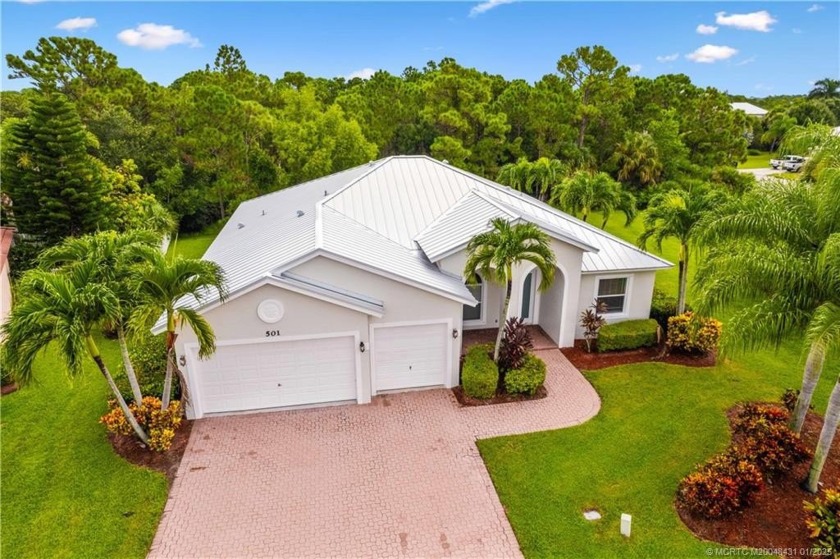 Welcome to this beautifully updated 4 bedroom PLUS den, CBS home - Beach Home for sale in Jensen Beach, Florida on Beachhouse.com