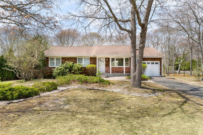 Welcome to your dream home! Nestled in Tiana Shores, within - Beach Home for sale in Hampton Bays, New York on Beachhouse.com