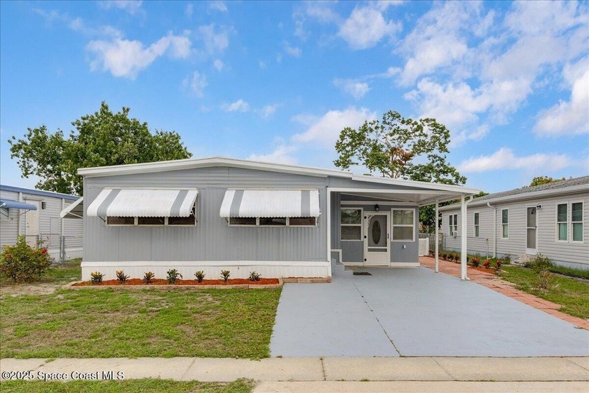 Welcome home to a wonderful 55+ community nestled in NE Palm Bay - Beach Home for sale in Palm Bay, Florida on Beachhouse.com