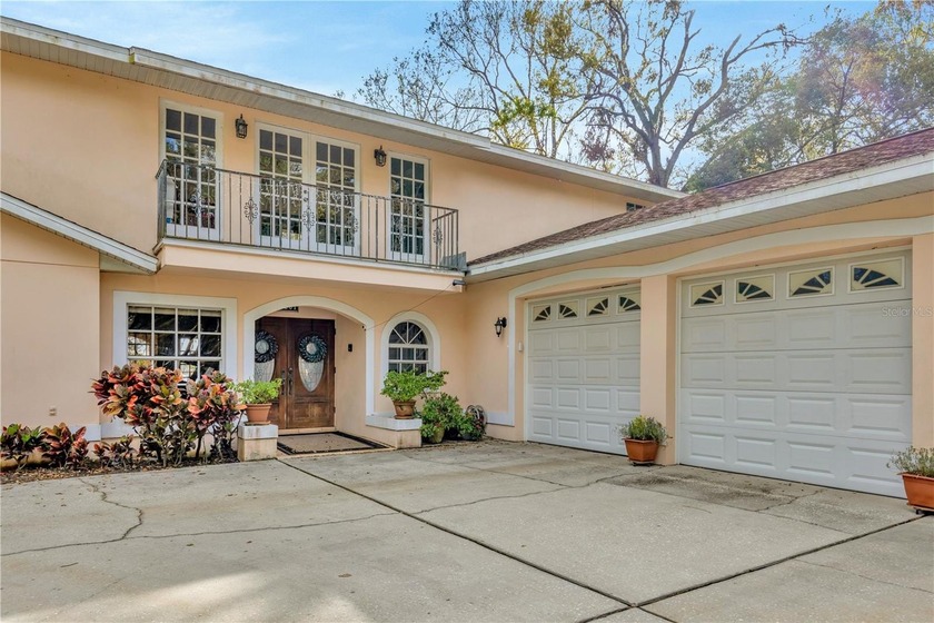 Mediterranean-style custom-built home is situated on over two - Beach Home for sale in Tampa, Florida on Beachhouse.com