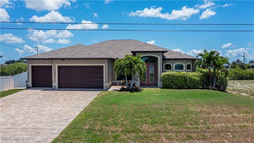 Waterfront Luxury Without the Flood Zone - Custom Home with Dock - Beach Home for sale in Cape Coral, Florida on Beachhouse.com