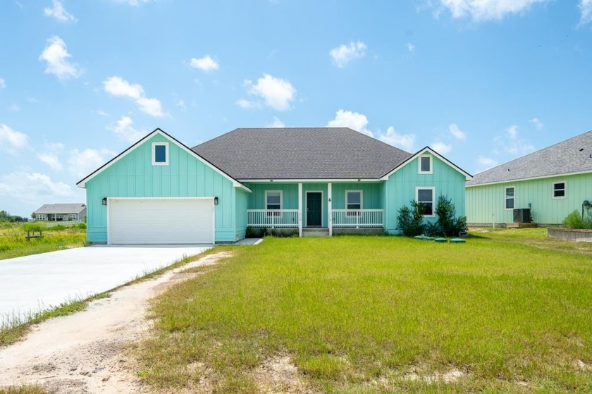 Welcome to 47 Lake Shore Circle, your new coastal home in the - Beach Home for sale in Rockport, Texas on Beachhouse.com