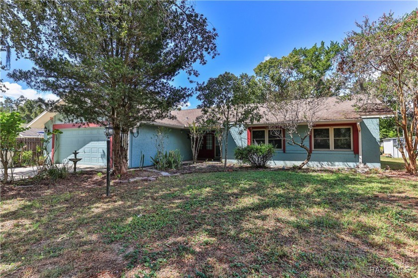 Discover waterfront living with this charming 3/2 home situated - Beach Home for sale in Crystal River, Florida on Beachhouse.com