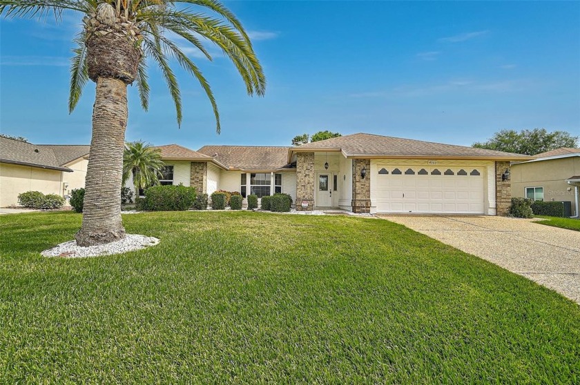 Located in Peridia Golf & Country Club, this 3BR/2BA home offers - Beach Home for sale in Bradenton, Florida on Beachhouse.com
