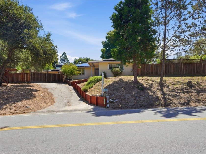 This inviting single-level home sits on a large, mostly flat - Beach Home for sale in Ben Lomond, California on Beachhouse.com