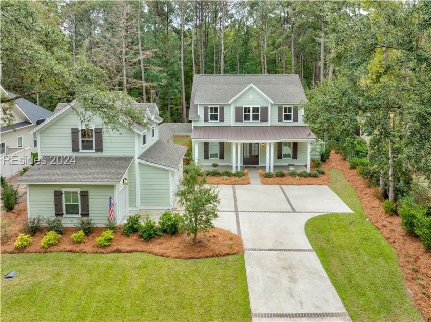 Completed in 2022, this beautiful 5 BR plus office home is - Beach Home for sale in Okatie, South Carolina on Beachhouse.com