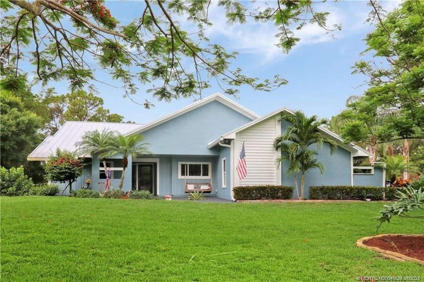 True Treasure! Nestled on a stunning acre of land, a beautiful - Beach Home for sale in Palm City, Florida on Beachhouse.com