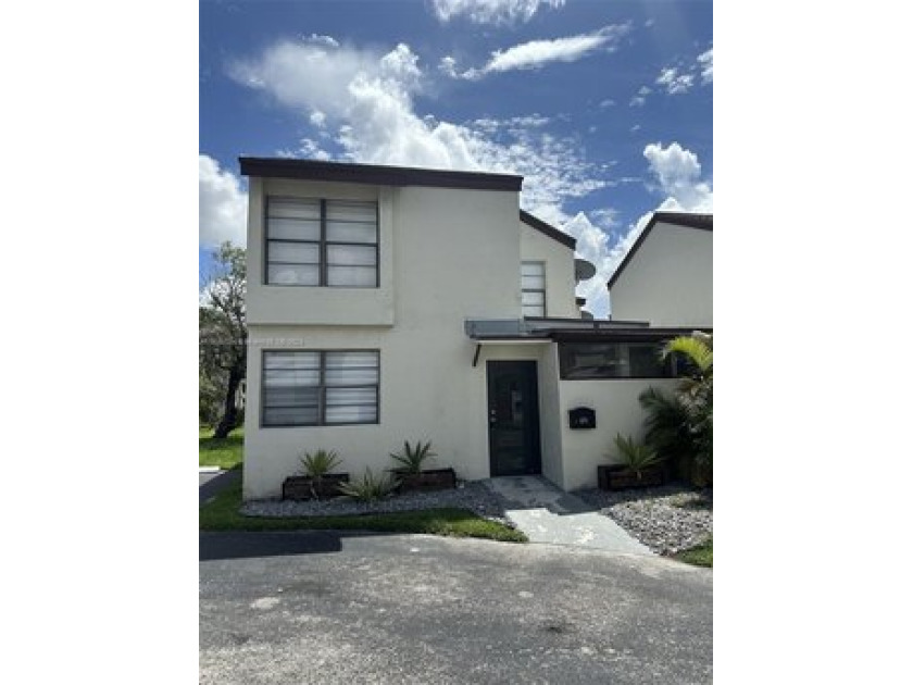 Completely updated, 3-bedroom 2-bathroom, two story unit in the - Beach Condo for sale in Miami, Florida on Beachhouse.com