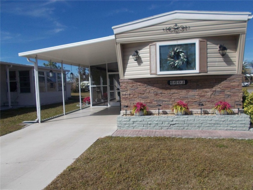 Welcome to 6603 Hauli Court where the curb appeal says it all - Beach Home for sale in North Port, Florida on Beachhouse.com