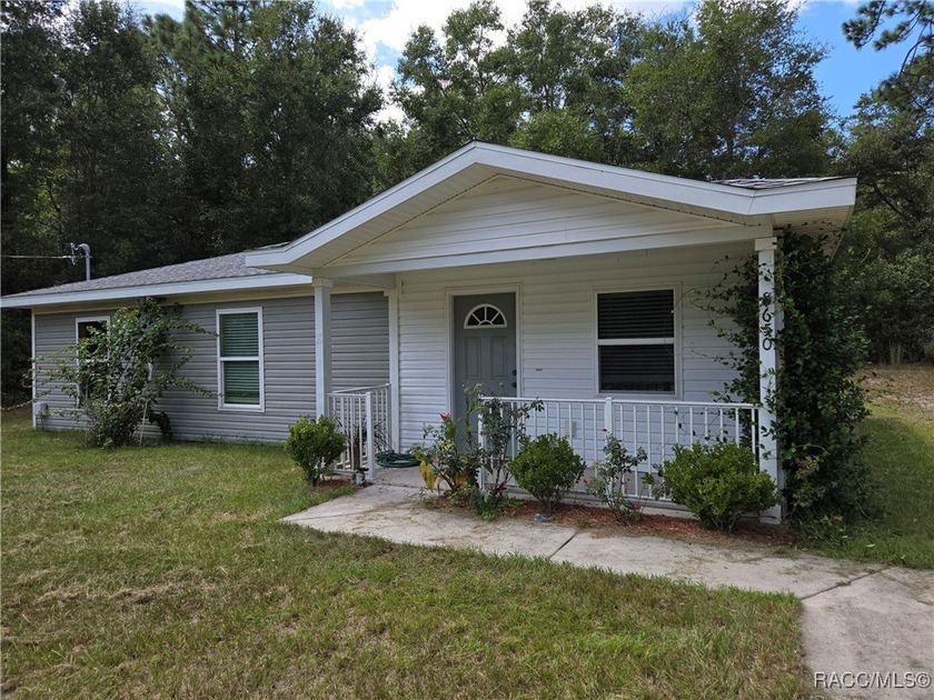 This 3 bedroom, 2-bath home sits on a spacious .23-acre lot in - Beach Home for sale in Crystal River, Florida on Beachhouse.com