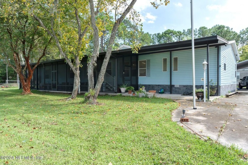 This 3-bedroom, 2-bath manufactured home with a covered inground - Beach Home for sale in Jacksonville, Florida on Beachhouse.com